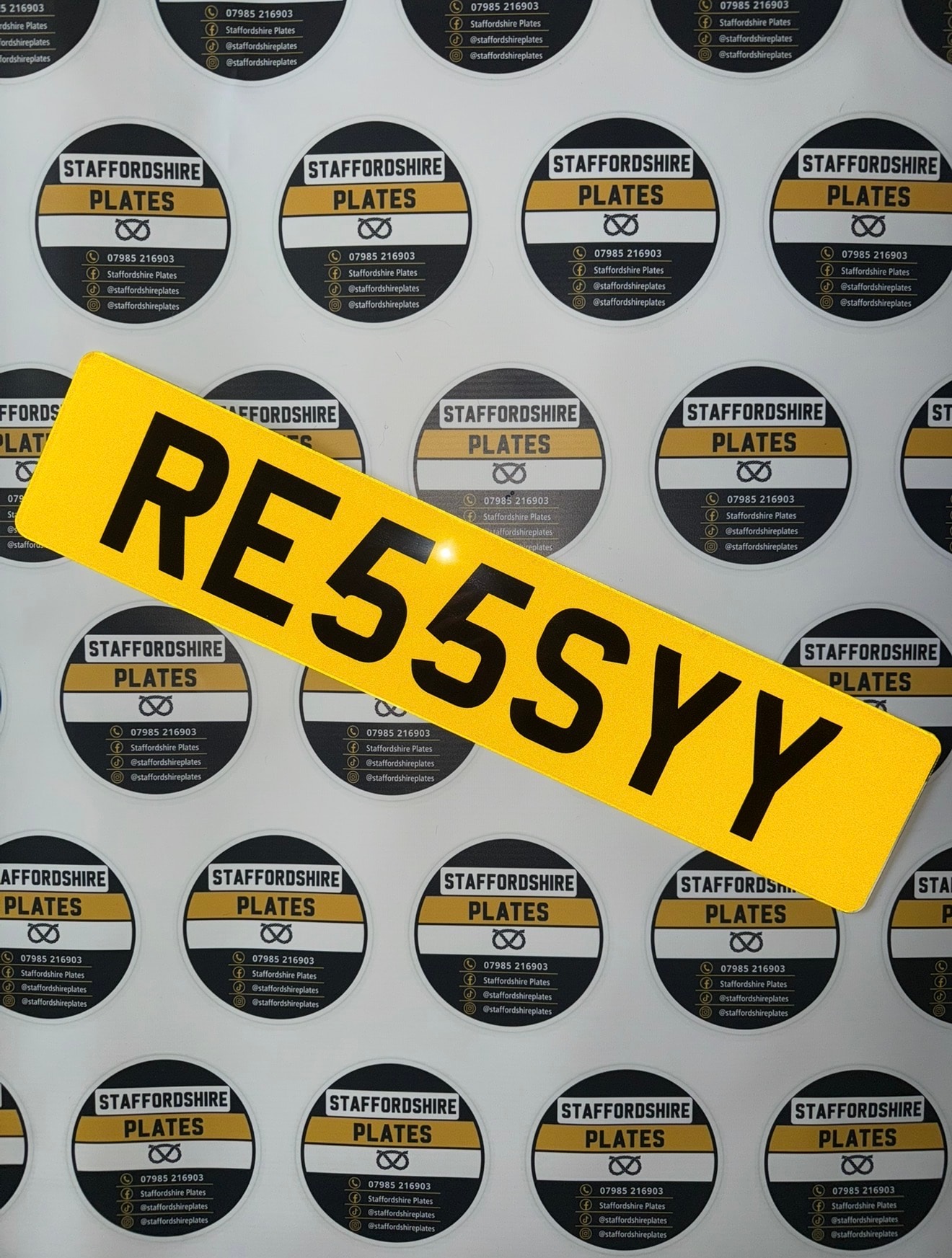 Yellow RE555 YY custom number plate